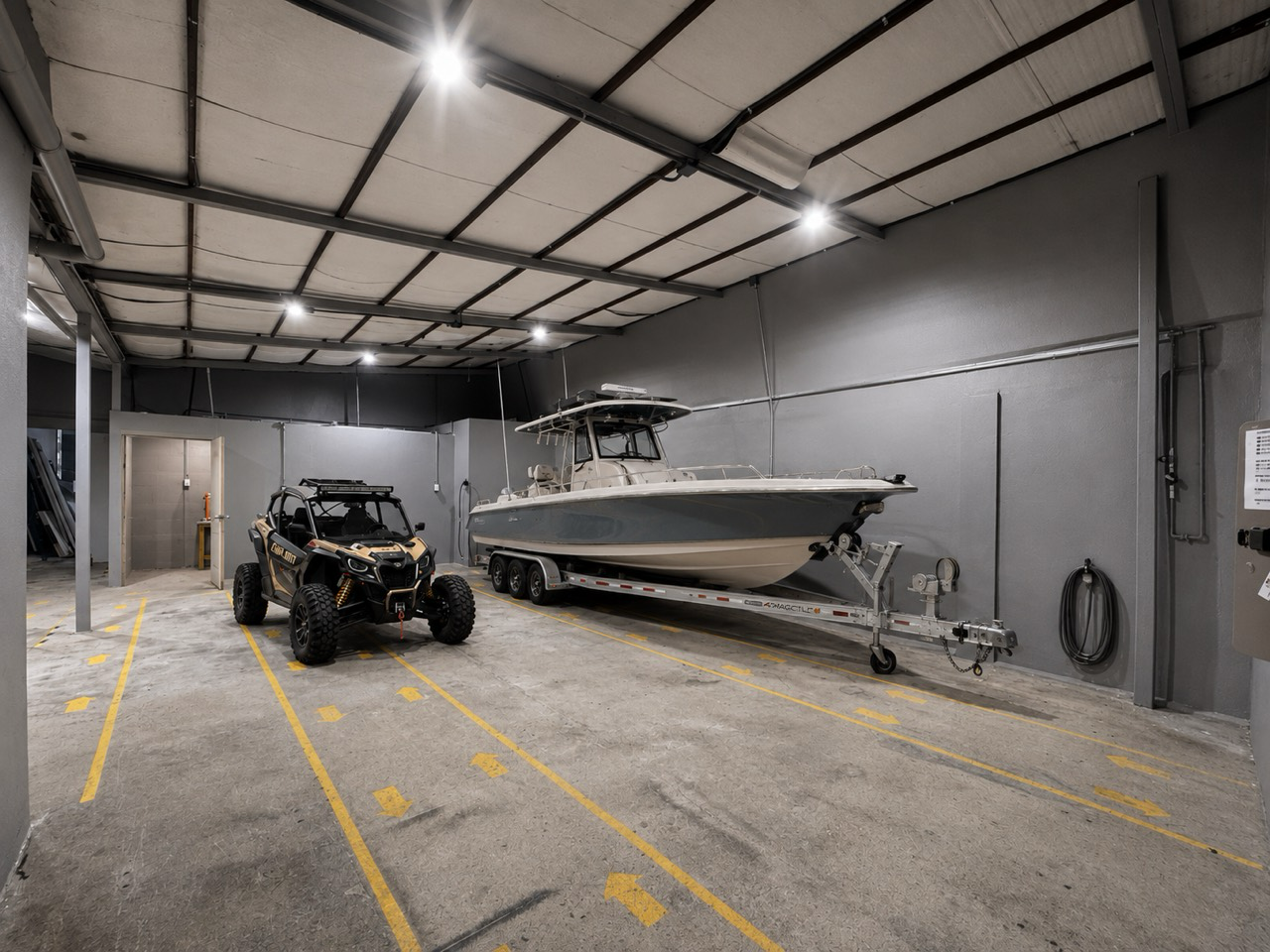 AI-generated visualization of a boat and UTV in marked indoor warehouse storage bays